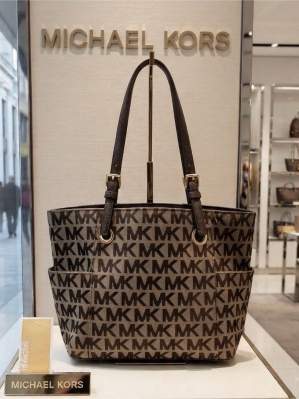 Michael Kors GUC Jet Set Logo
Tote.Coated canvas Beige & Brown MK
Leather straps